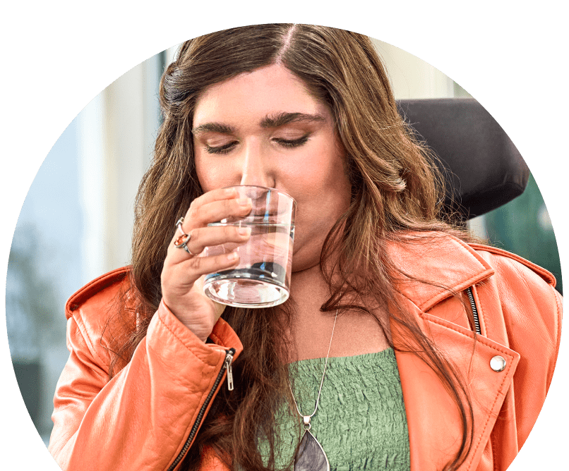 Lyza drinking a glass of water