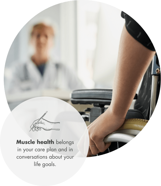 A person in a wheelchair and a healthcare professional in a clinical setting